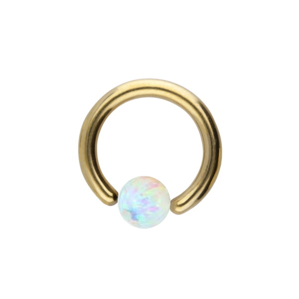 Goldener Titan Ring mit Opal im Piercing Center Norden